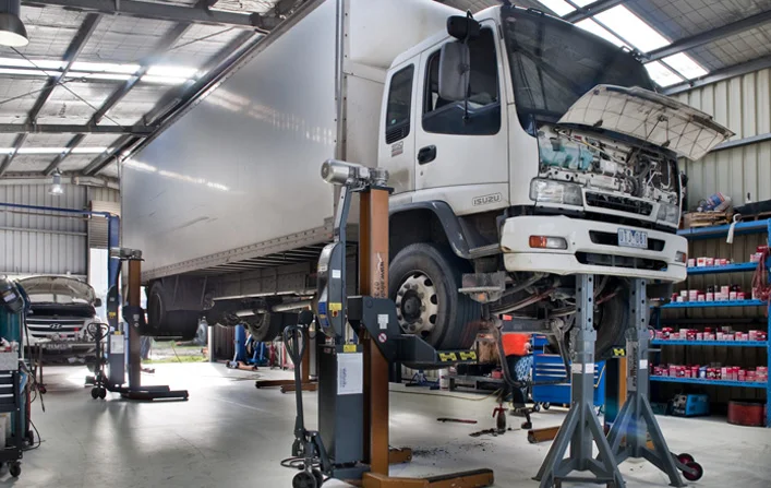 Truck inside repair facility